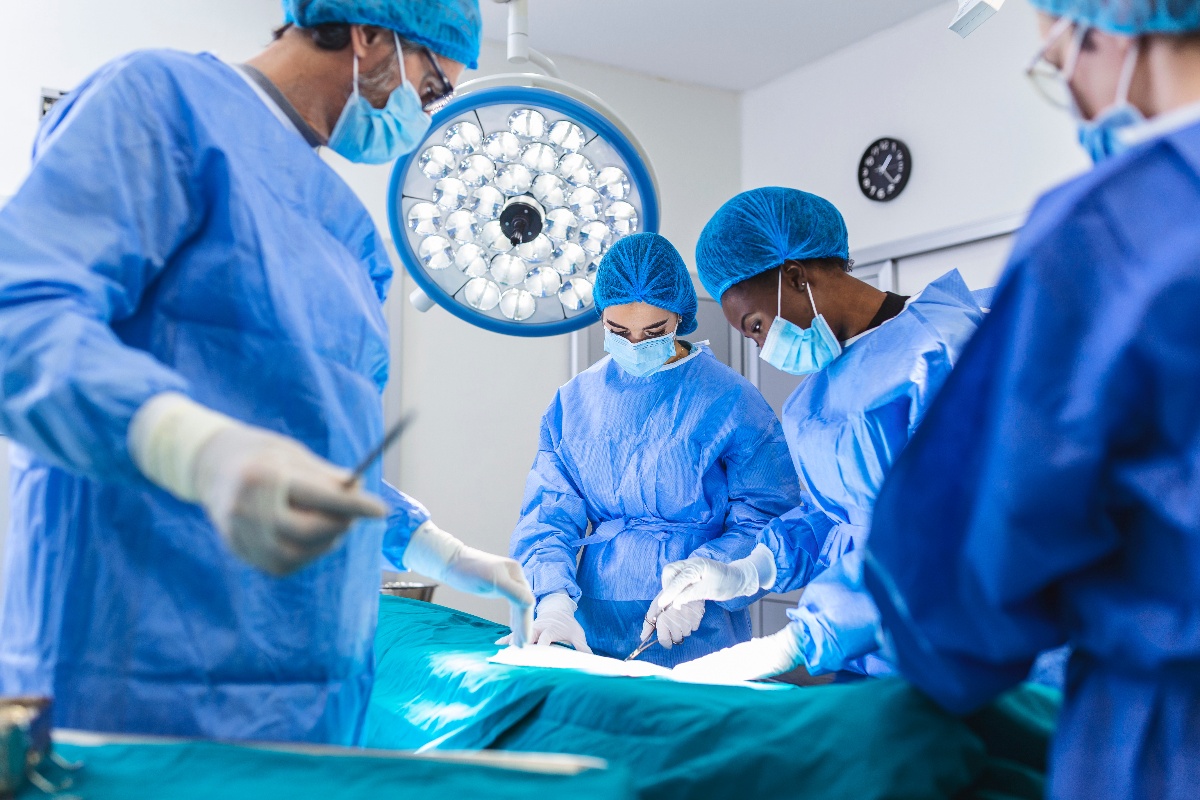 Four surgeons operate on a patient at a local hospital. 